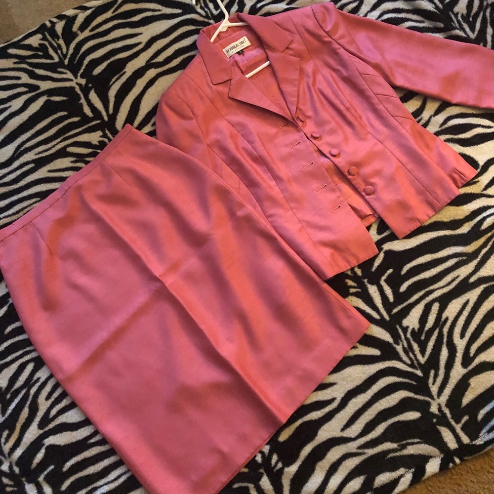 Pink suit.
